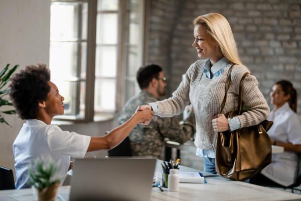 Patient checking in at the front desk of Therapeutic Family Services